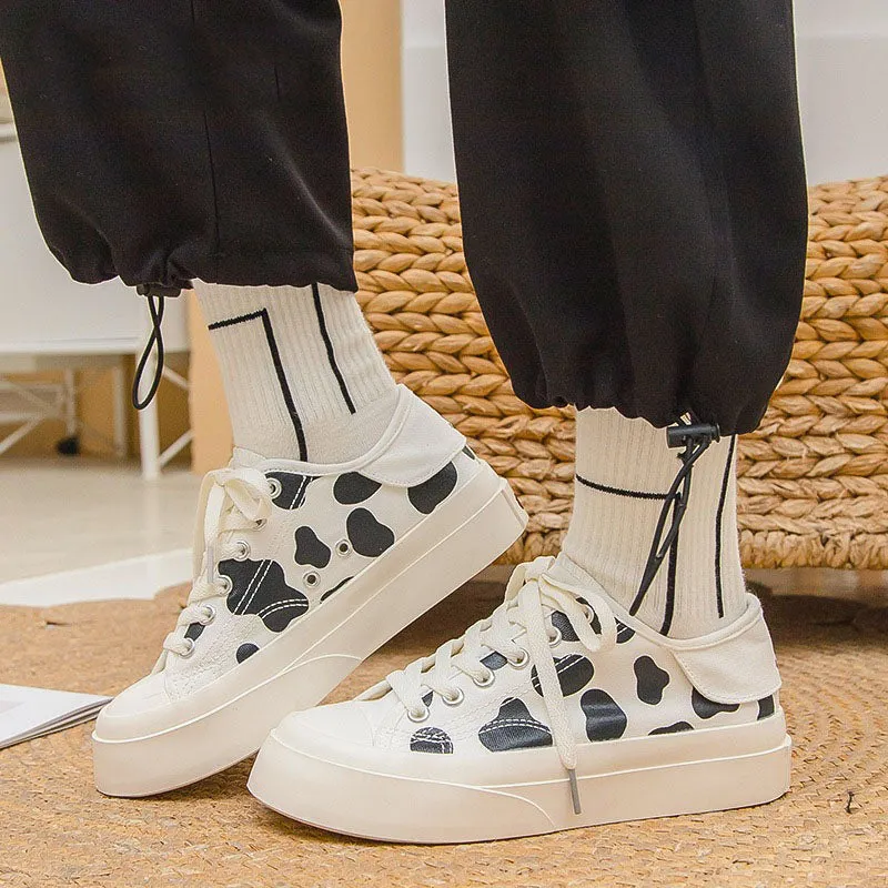 BLACK WHITE COW MILK CANVAS SHOES UB2628