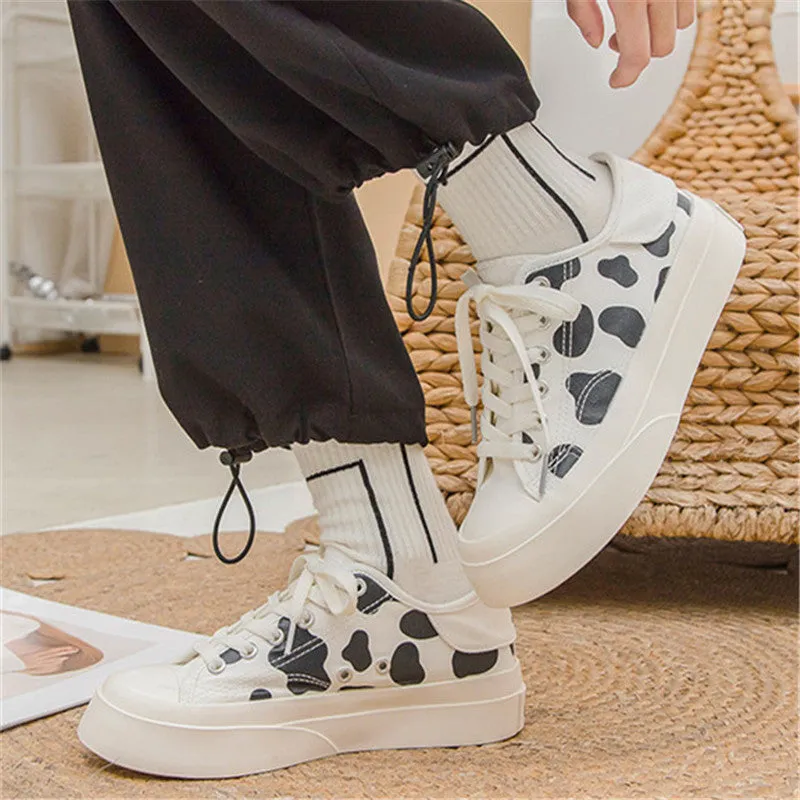 BLACK WHITE COW MILK CANVAS SHOES UB2628